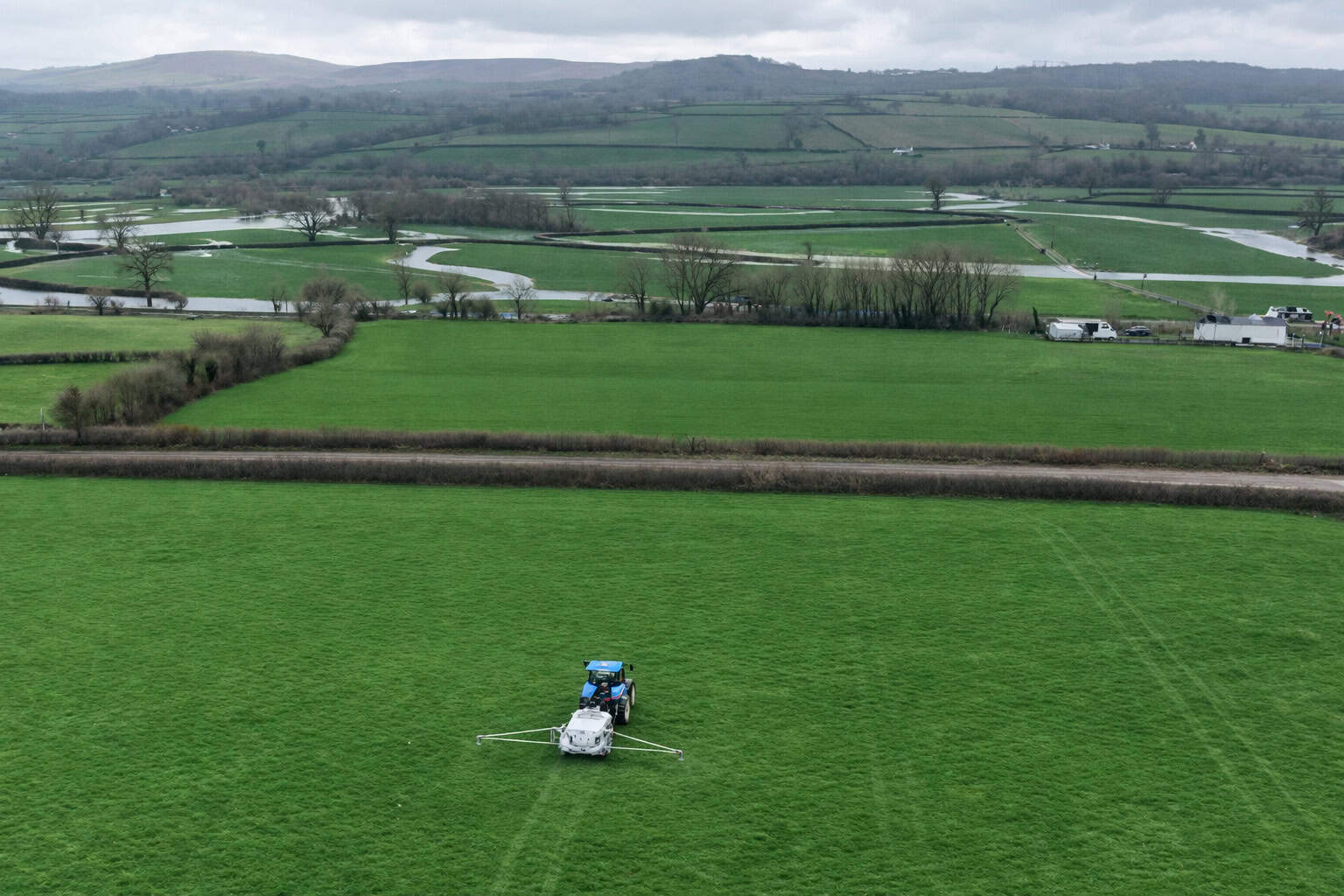 tow and fert applying dissolved urea to welsh pasture